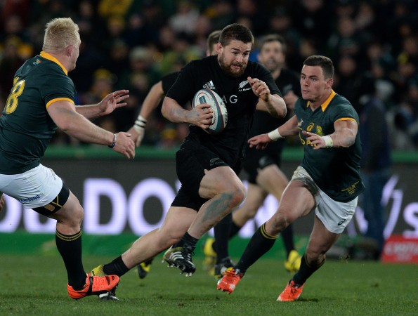Runaway train: Dane Coles on the way to his spectacular try against South Africa