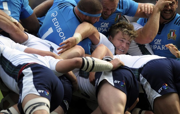 Peekaboo: David Denton looks out from the middle of a maul