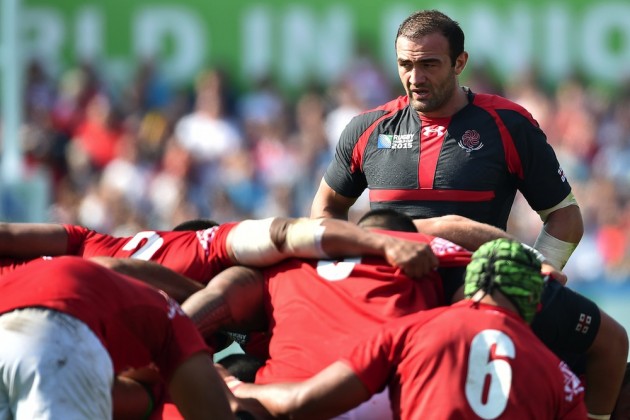 Georgia's number 8 and captain Mamuka Gorgodze stands beside a scrum against Tonga