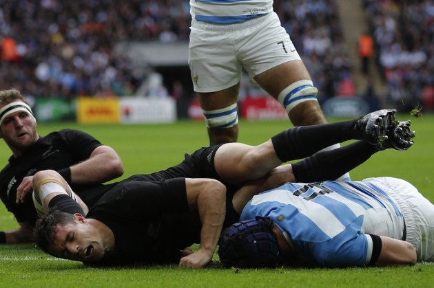 Guido Petti collides with Dan Carter's shin as he scores against the All Blacks