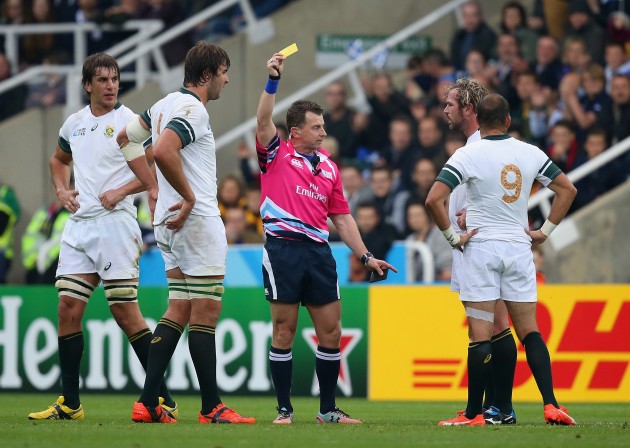 Cards out: Nigel Owens gives Jannie du Plessis a yellow card