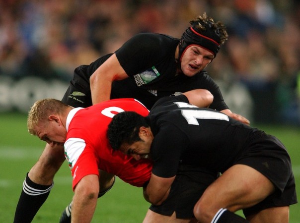 Fresh faced - A young looking Richie McCaw tackles Alix Popham of Wales during the 2003 Rugby World Cup (Photo: Getty)