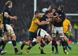 Pivotal moment: The ball ricochets from Australia's prop Greg Holmes, Scotland's flanker John Hardie, Australia's scrum half Nick Phipps and Scotland's back row forward Josh Strauss challenge for it, leading to a penalty awarded to Australia