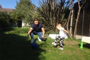 Father and Son playing Rugby
