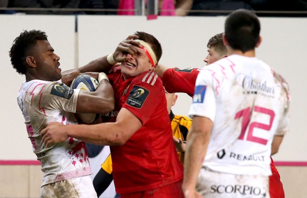 A bad hand: Josaia Raisuqe puts his hand into the face of CJ Stander (Photo: Inpho)