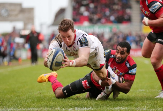 Going down: Craig Gilroy scoring one of Ulster's eight tries against Oyonnax. (Photo: Inpho)