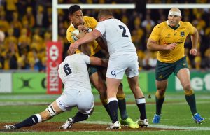 At the double: Chris Robshaw and Dylan Hartley combine to stop Australia dangerman Israel Folau