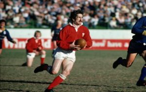 Gerald Davies of Wales runs with the ball during the Welsh tour to Australia.