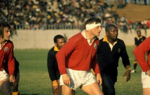 Willie John McBride playing for the Lions
