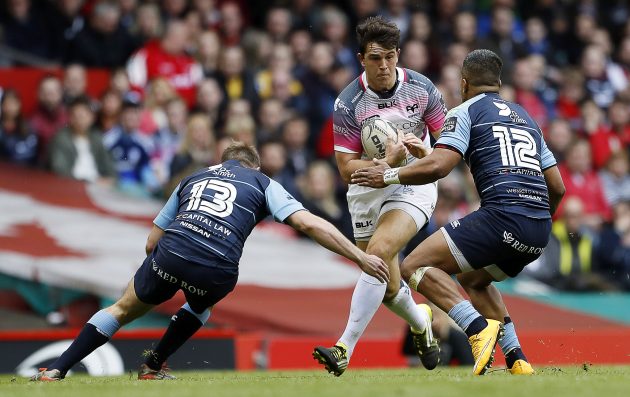 Centre of attention: Owen Watkin on the attack for the Ospreys.