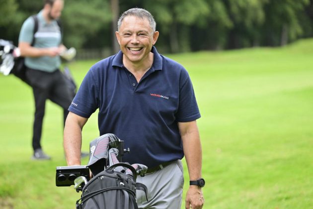 Rory Underwood playing golf