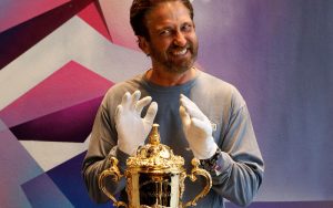 Gerard Butler Gets To Grips With Rugby World Cup Trophy
