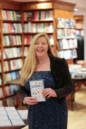 Win Good for a Grin Brenda Burling with her book