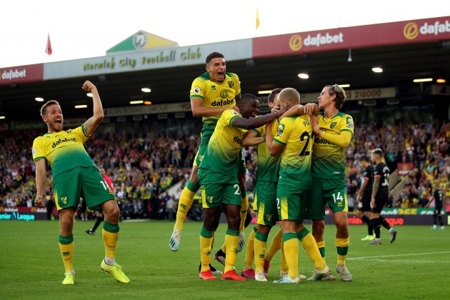 Norwich City celebrate a goal v Liverpool