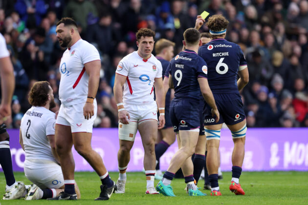 Henry Arundell of England is shown a yellow card by referee Nika Amashukeli (obscured) during the Guinness Six Nations 2026 match between Scotland and England at Scottish Gas Murrayfield on February 14, 2026 in Edinburgh, Scotland. (Photo by Stu Forster/Getty Images)