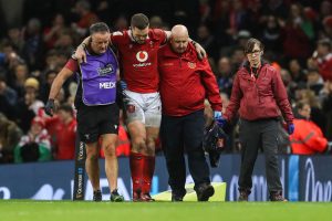 Wales' centre George North (C) is helped to leave the pitch following an injury during the Six Nations international rugby union match between Wales and Italy at the Principality Stadium (Getty Images)