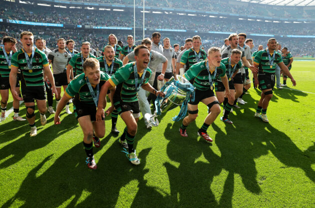 Alex Mitchell and Tom Pearson lead the Northampton Saints celebrations after winning the Premiership Rugby title in 2024.