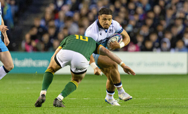 Scotland's Sione Tuipulotu runs into a tackle from South Africa's Handre Pollard during the 2024 Autumn Nations Series.