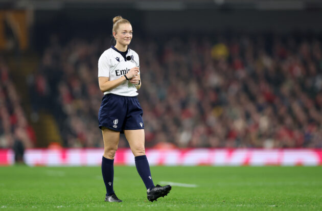 Scottish referee Hollie Davidson walks across the field during the 2025 Quilter Nations Series match between Wales and New Zealand