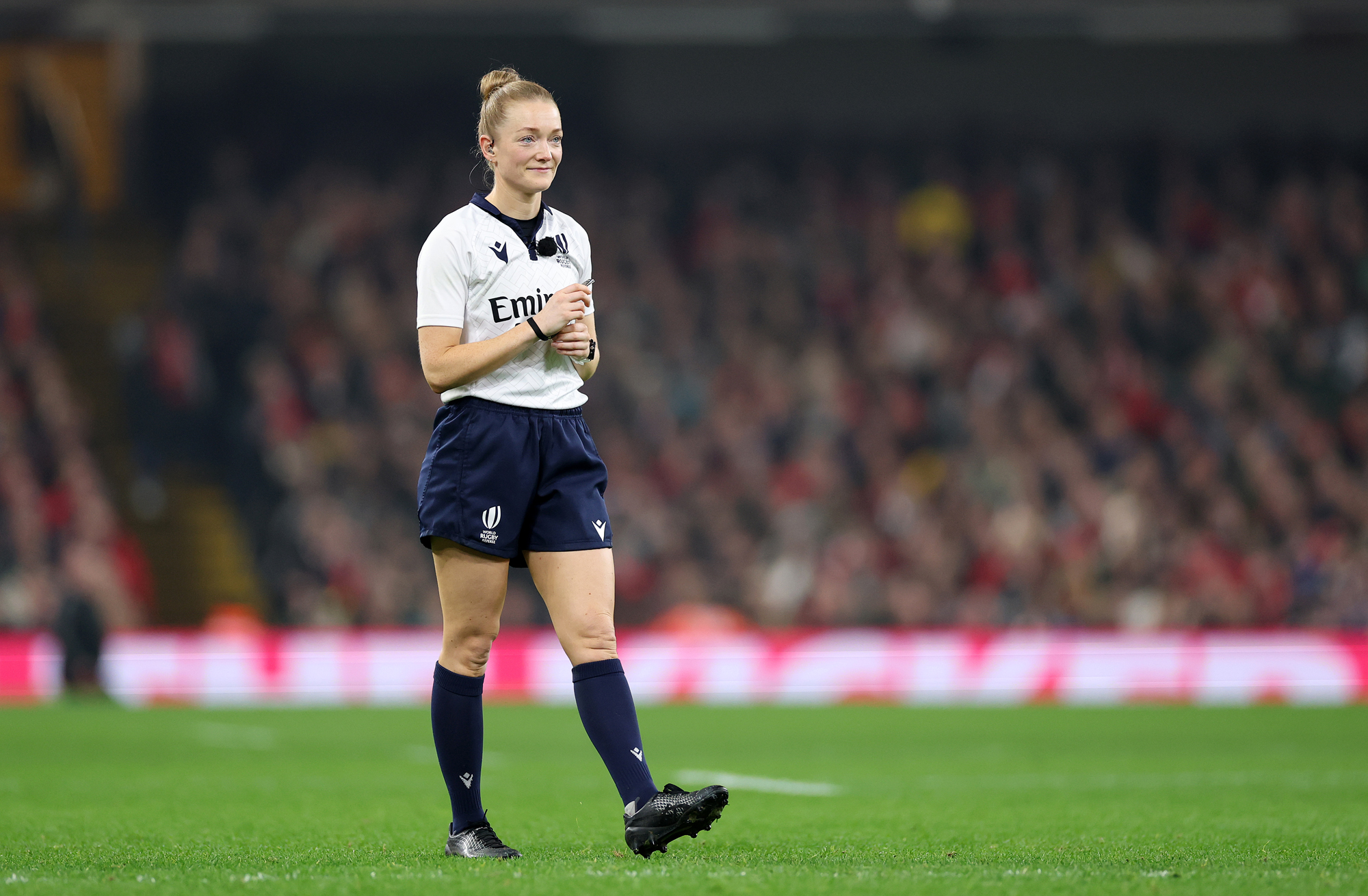 Scottish referee Hollie Davidson walks across the field during the 2025 Quilter Nations Series match between Wales and New Zealand