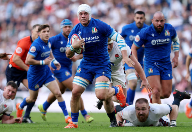 Italy's Manuel Zuliani running with the ball in the Six Nations 2025 match against England.