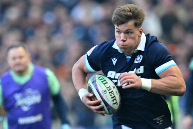 Scotland’s Huw Jones runs with the ball during the 2025 Men’s Six Nations match against Wales