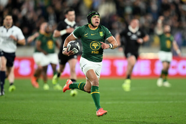Cheslin Kolbe on his way to scoring a try against New Zealand during the Rugby Championship match in Wellington in September 2025.