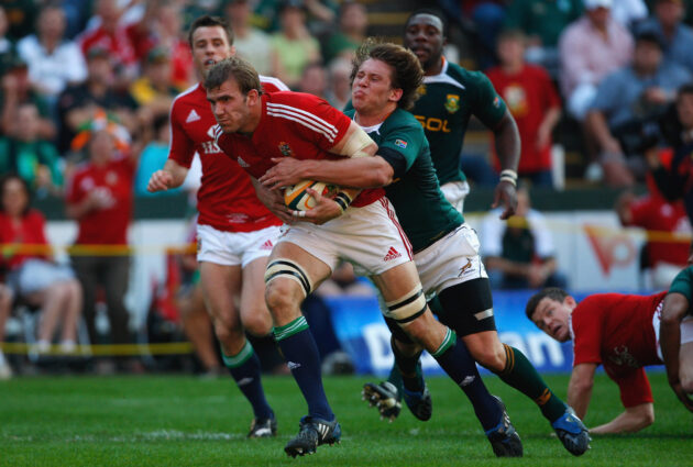 Tom Croft runs with the ball for the British & Irish Lions in the first test against South Africa.