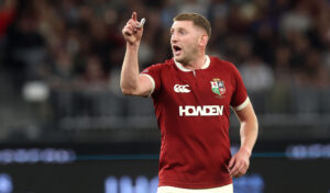 Finn Russell gesticulates with teammates during the British & Irish Lions' 2025 match against Western Force in Perth.