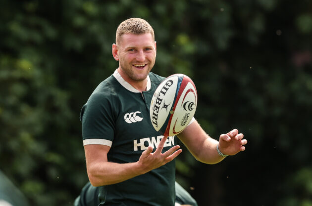 Finn Russell warming up for the British & Irish Lions. (INPHO/Billy Stickland)