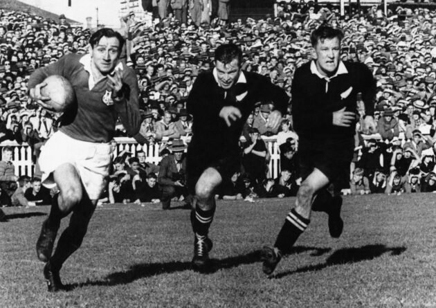 A British & Irish Lions player runs with the ball against New Zealand in 1950.