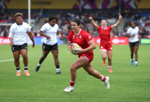 Julia Schell on her way to scoring her fifth try in Canada's 2025 Rugby World Cup win over Fiji.