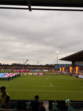 Canada and Fiji run onto the pitch at the 2025 Women's Rugby World Cup.