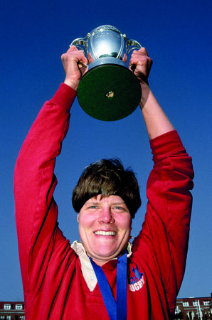 Victorious USA player Patricia 'Patty' Jervey holds aloft the Women's Rugby Union World Cup Trophy. (Photo by Howard Boylan/Allsport/Getty Images/Hulton Archive)