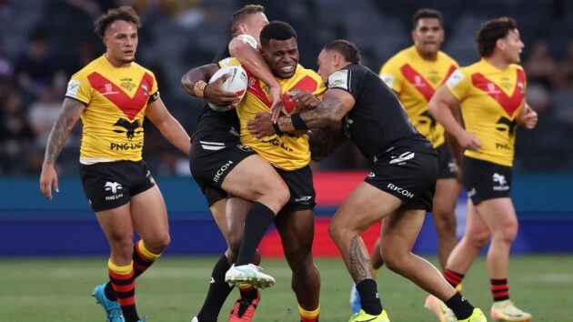 Sylvester Namo of Papua New Guinea is tackled during the 2024 Pacific Championships Pacific Bowl Men's match between the New Zealand Kiwis and PNG Kumuls at CommBank Stadium on November 10, 2024 in Sydney, Australia.