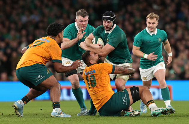 Lukhan Salakaia-Loto of Australia tackles Ireland's Caelan Doris during the 2024 Autumn Nations Series