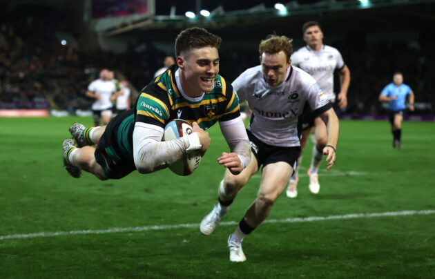 Tommy Freeman dives to score his fourth try during Northampton Saints' October 2025 Gallagher PREM win against Saracens.