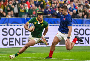 South Africa's Kurt-Lee Arendse evades France's Thomas Ramos to score the Springboks first try in the 2023 World Cup quarter-final.