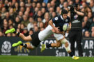 New Zealand's Leroy Carter tackles Scotland's Darcy Graham during the 2025 Autumn Nations Series match in Edinburgh