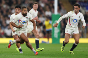 England's Ollie Lawrence runs with the ball during the 2025 Quilter Nations Series against Fiji
