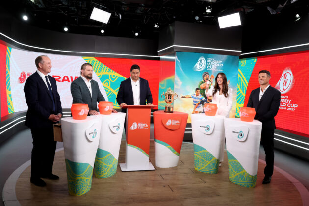 Alicia Lucas holds up a ball during the draw for the 2027 Men’s Rugby World Cup in Sydney