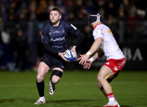 Finn Russell of Bath looks to make a pass during the December 2025 European Champions Cup match against Munster
