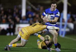 Bath's Henry Arundell runs with the ball during the December 2025 PREM Rugby match against Northampton Saints.
