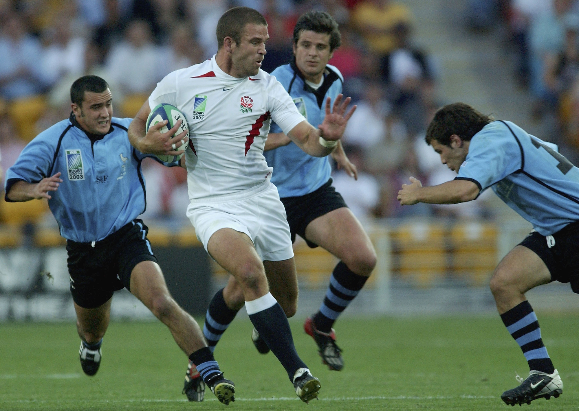 England’s Joe Worsley avoids a tackle during the 2003 World Cup match against Uruguay