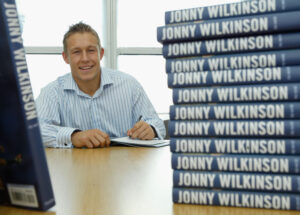 Jonny Wilkinson with his book (Getty Images)