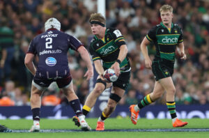 Northampton Saints’ Henry Pollock prepares to offload during the 2025 European Champions Cup final against Bordeaux-Bègles.