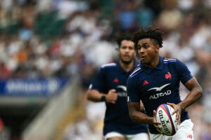 France's Theo Attissogbe runs with the ball during the June 2025 match against an England XV.