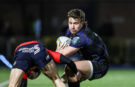 Glasgow Warriors' Kyle Rowe evades a tackle during the January URC match against Munster.