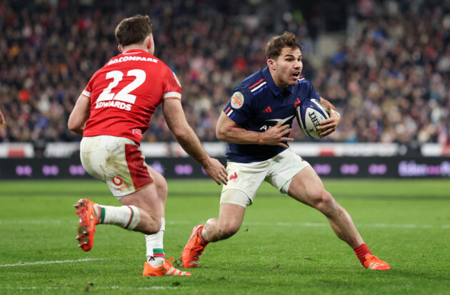 France's Antoine Dupont runs with the ball during the 2025 Six Nations match against Wales