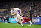 England’s Henry Arundell evades Wales’ Ellis Mee to score his team’s first try in the 2026 Six Nations match against Wales